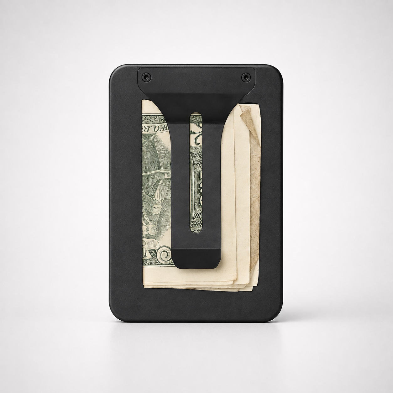 Maverick MagSafe Money Clip attached to a BNDT wallet holding folded bills and receipts