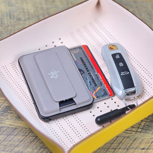 Grey BNDT Maverick slim MagSafe wallet with a key