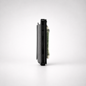 Side profile of the Maverick MagSafe Money Clip showing its slim thickness on a Maverick wallet
