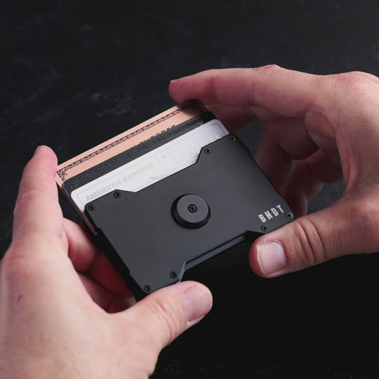 This slim card holder is more than just a wallet. It's also a way to relieve your tension