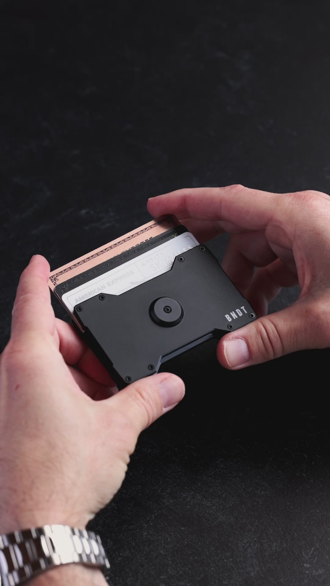 This slim card holder is more than just a wallet. It's also a way to relieve your tension